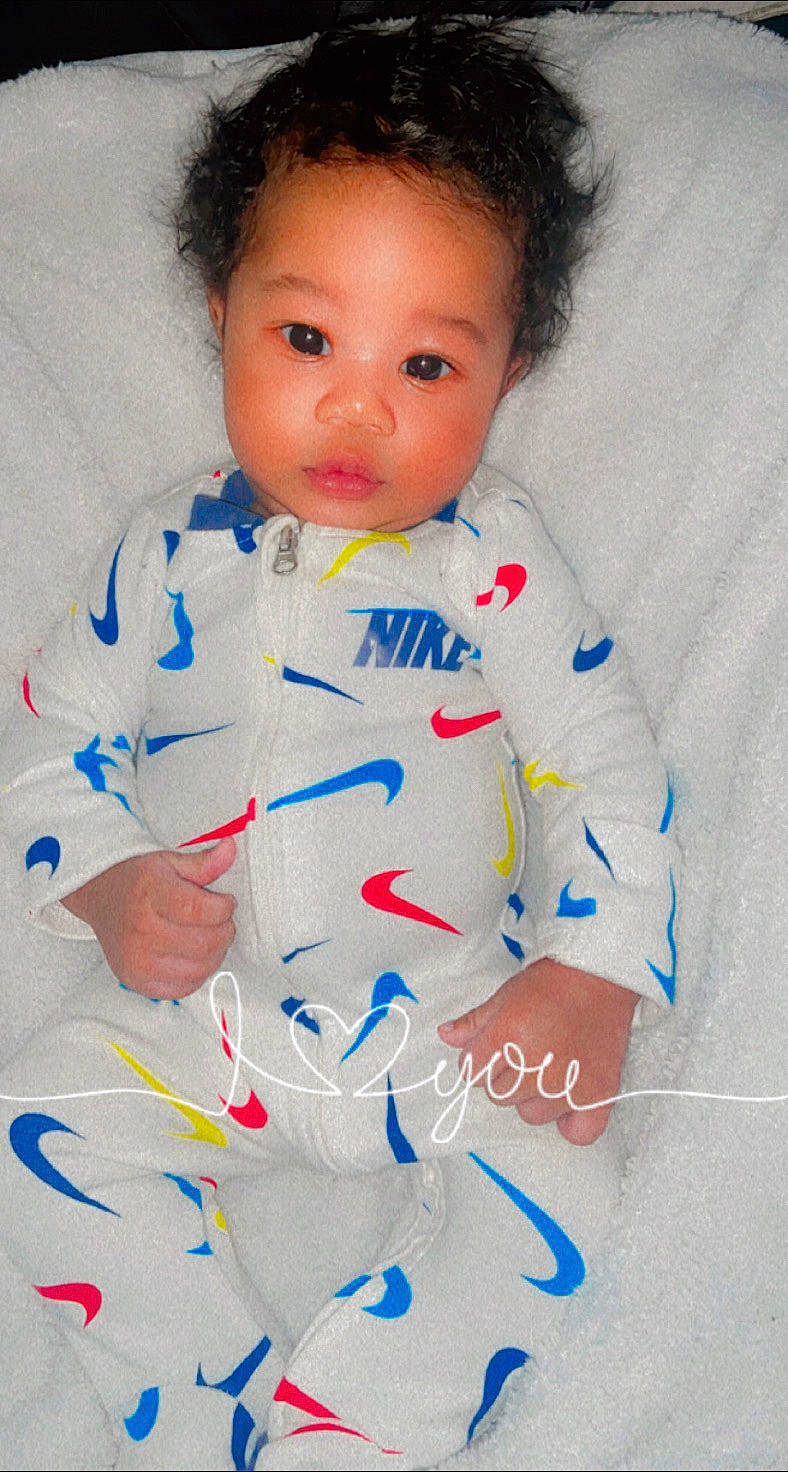 Jamir is registered to the contest to win money with this photo: arm, baby_toddler_clothing, cheek, child, chin, eye, eyebrow, face, hair, hairstyle, happy, head, human_body, lip, neck, nose, person, skin, sleeve, t_shirt