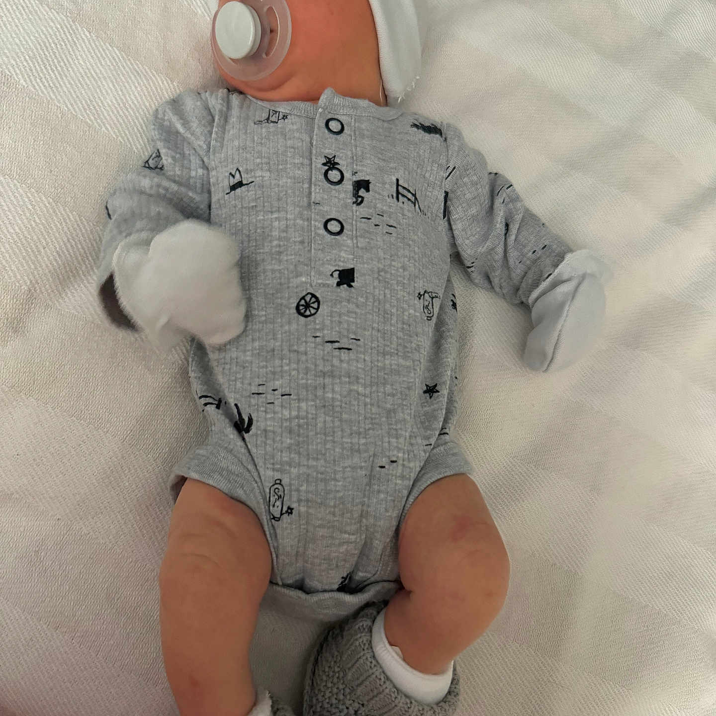 Colt joined the competition — help win amazing prizes! architecture, baby, babylaughing, bonnet, cap, clothing, couch, face, furniture, happy, hat, head, hosiery, pants, person, sitting, sleeve, smile, sock, yawning