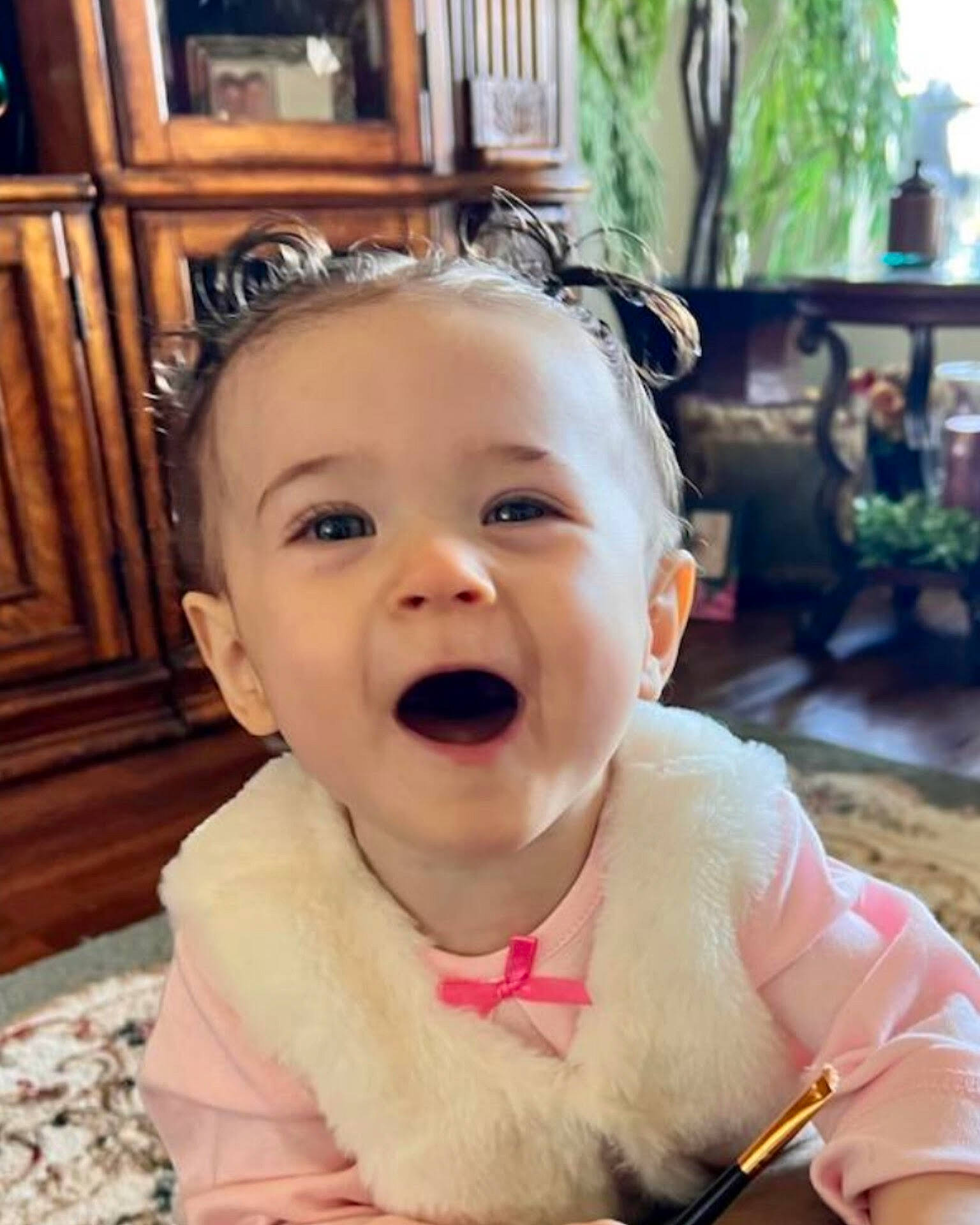 Naora is registered to the contest to win money with this photo: baby, baby_toddler_clothing, chair, cheek, child, chin, event, fun, hairstyle, happy, iris, leisure, lip, mouth, nose, person, plant, sitting, skin, smile