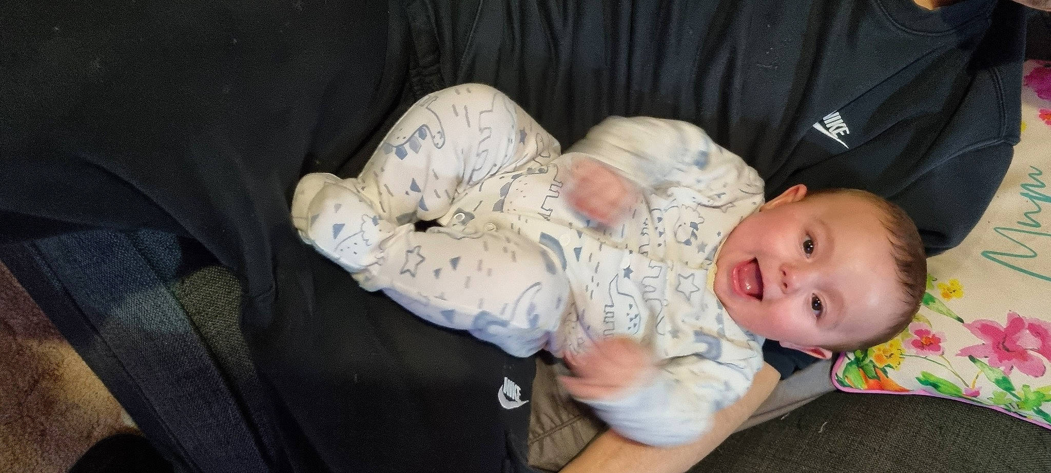 Kenzo is registered to the contest to win money with this photo: arm, baby, baby_products, baby_safety, baby_sleeping, baby_toddler_clothing, bedtime, cheek, child, comfort, head, lap, nap, person, sitting, sleeve, toddler