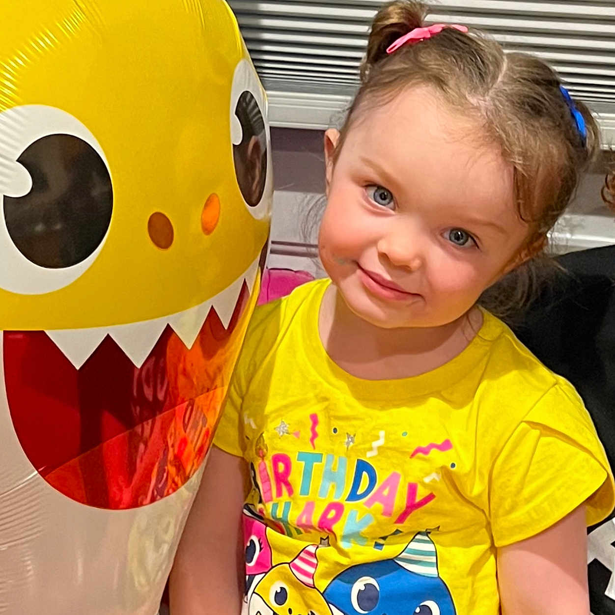 Ezra is registered to the contest to win money with this photo: ball, balloon, child, clothing, costume, face, female, football, girl, happy, head, inflatable, person, photography, portrait, smile, soccer, soccerball, sport, t_shirt