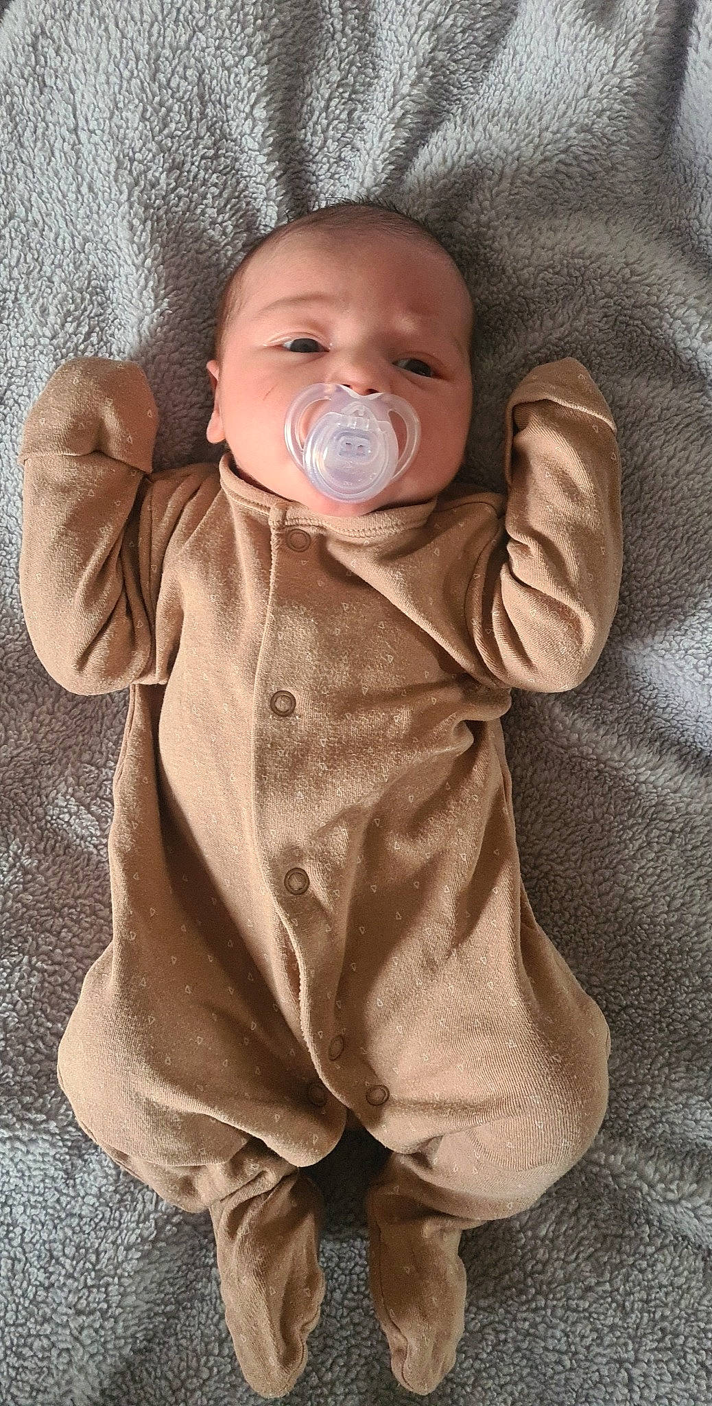 Reyn is registered to the contest to win money with this photo: baby, baby_products, baby_sleeping, baby_toddler_clothing, cheek, child, chin, comfort, eye, face, finger, gesture, head, lip, mouth, nose, person, sitting, skin, sleeve