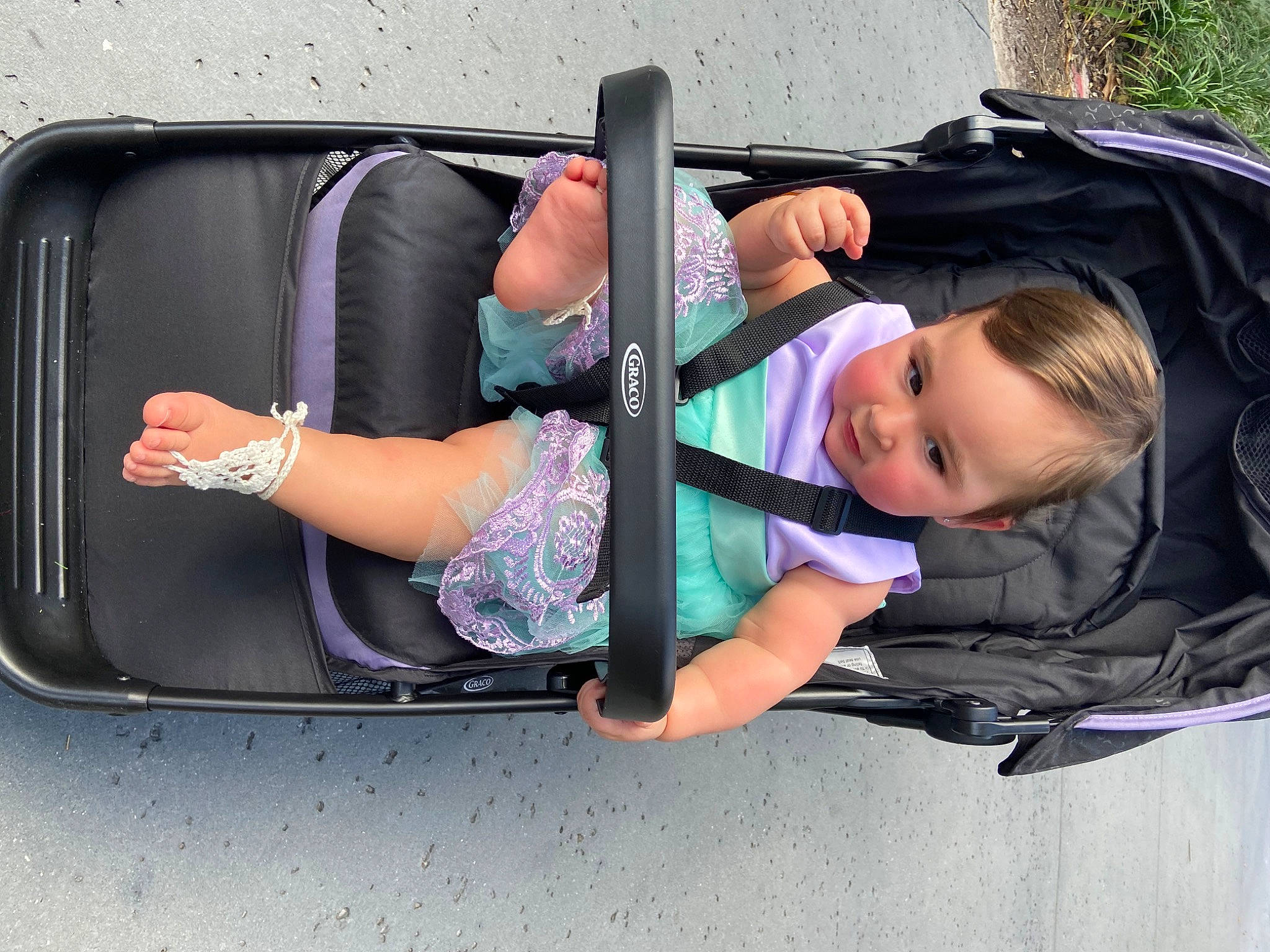 Kali joined the competition — help win amazing prizes! auto_part, automotive_design, automotive_exterior, baby_carriage, baby_products, bumper, child, comfort, fun, leisure, motor_vehicle, person, product, recreation, sitting, smile, toddler, travel, trunk, vehicle