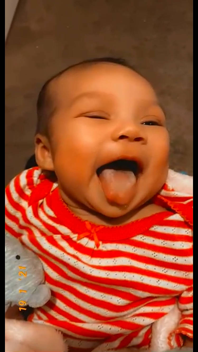 Emire is registered to the contest to win money with this photo: baby, baby_laughing, baby_toddler_clothing, cheek, child, close_up, comfort, eyebrow, fun, gesture, happy, iris, lip, mouth, nose, person, product, skin, sleeve, smile