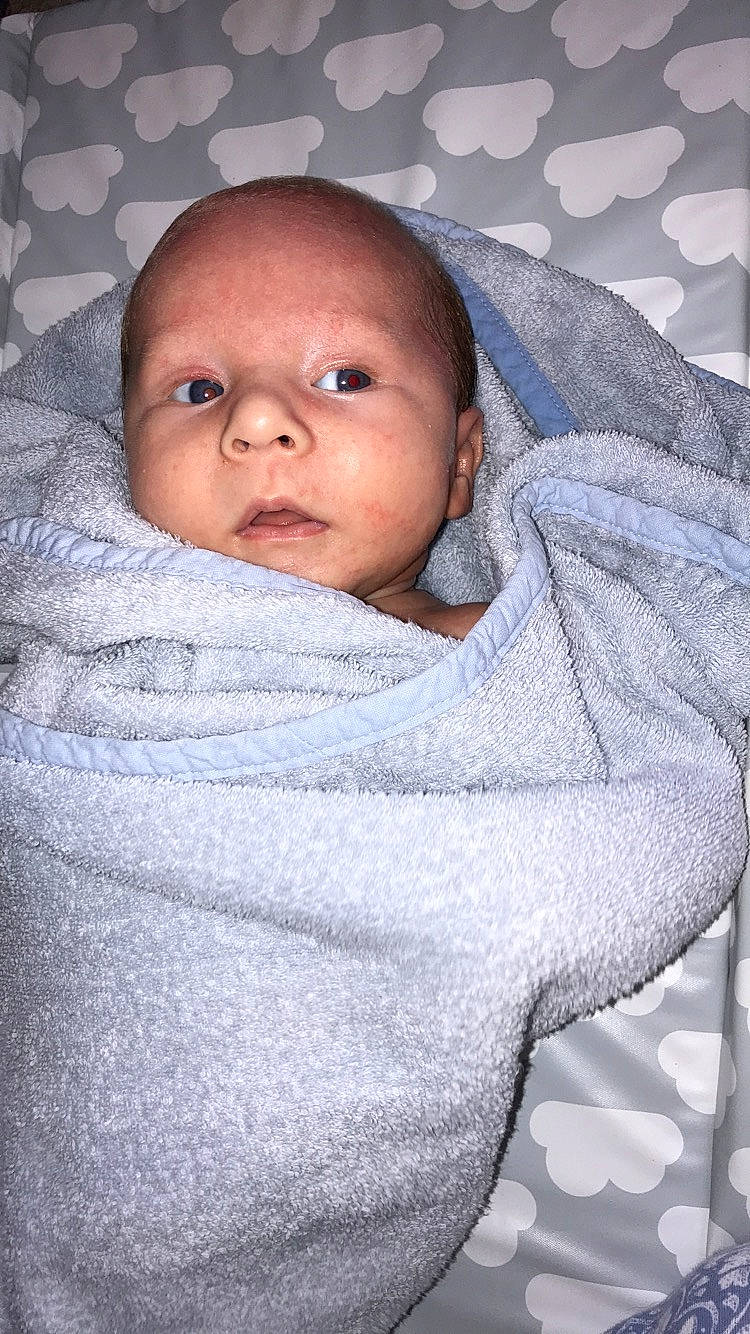 Dion joined the competition — help win amazing prizes! baby, blanket, cheek, child, chin, eye, face, head, linens, lip, nose, person, product, skin, smile, textile, toddler