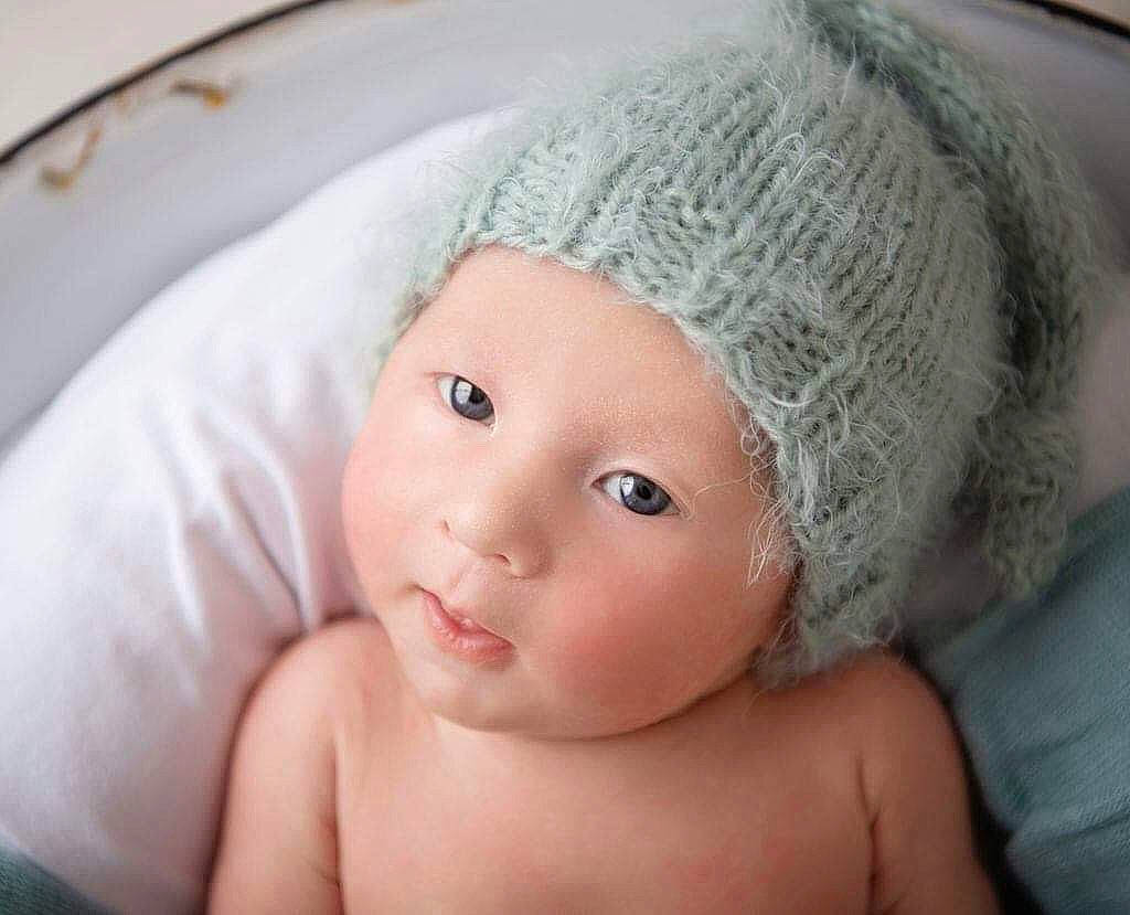 Dion joined the competition — help win amazing prizes! baby, bonnet, cheek, child, close_up, ear, eye, eyebrow, face, forehead, hand, head, headgear, iris, lip, mouth, nose, person, photography, skin