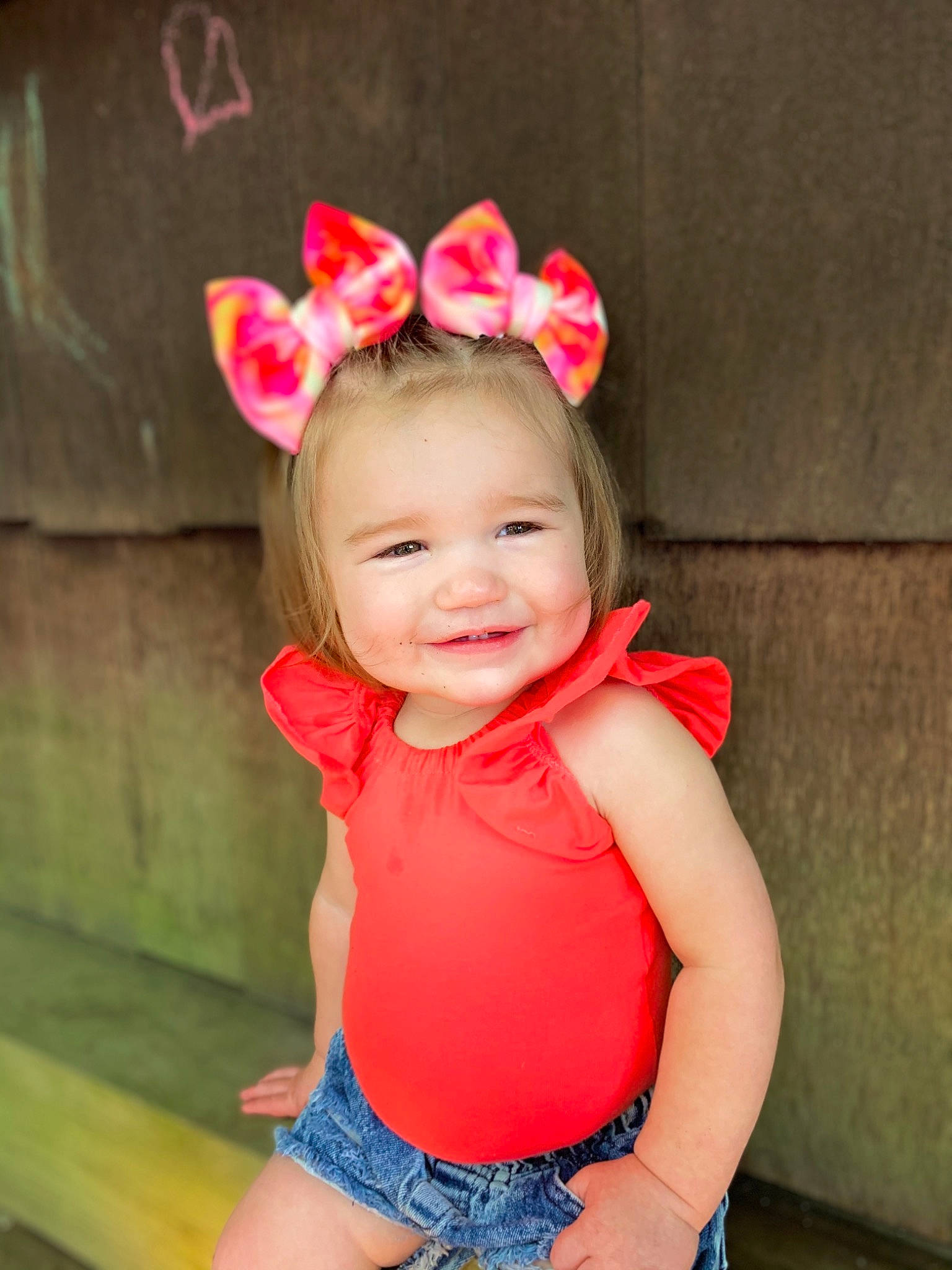 Ruby Cate joined the competition — help win amazing prizes! baby_toddler_clothing, clothing, eye, face, facial_expression, grass, happy, headgear, headpiece, human_body, joy, lip, neck, person, pink, shorts, skin, sleeve, smile, thigh
