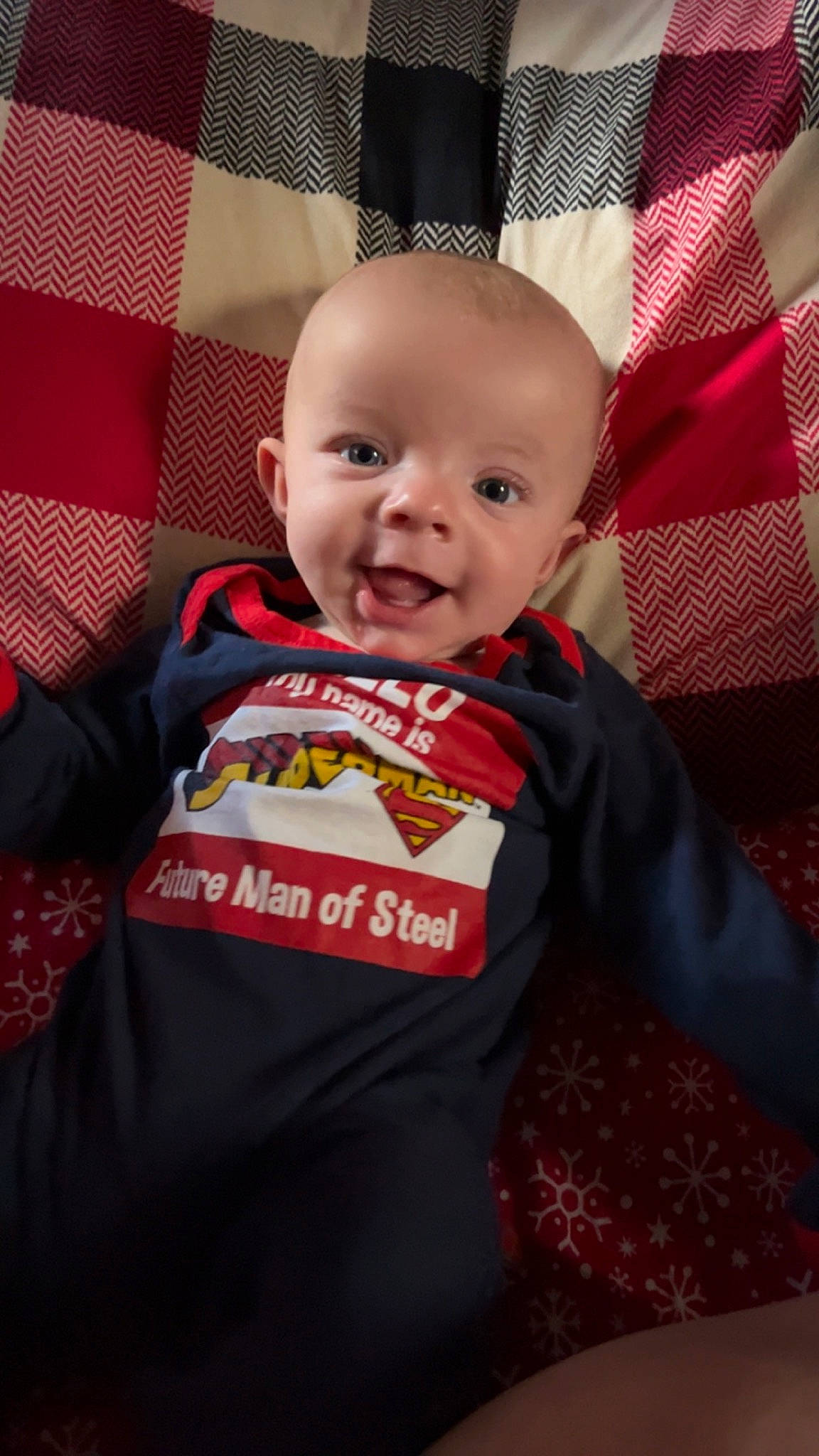 Ryker joined the competition — help win amazing prizes! baby, baby_products, baby_toddler_clothing, carmine, child, christmas, eye, fictional_character, fun, happy, logo, magenta, orange, pattern, person, room, sitting, sleeve, smile, t_shirt