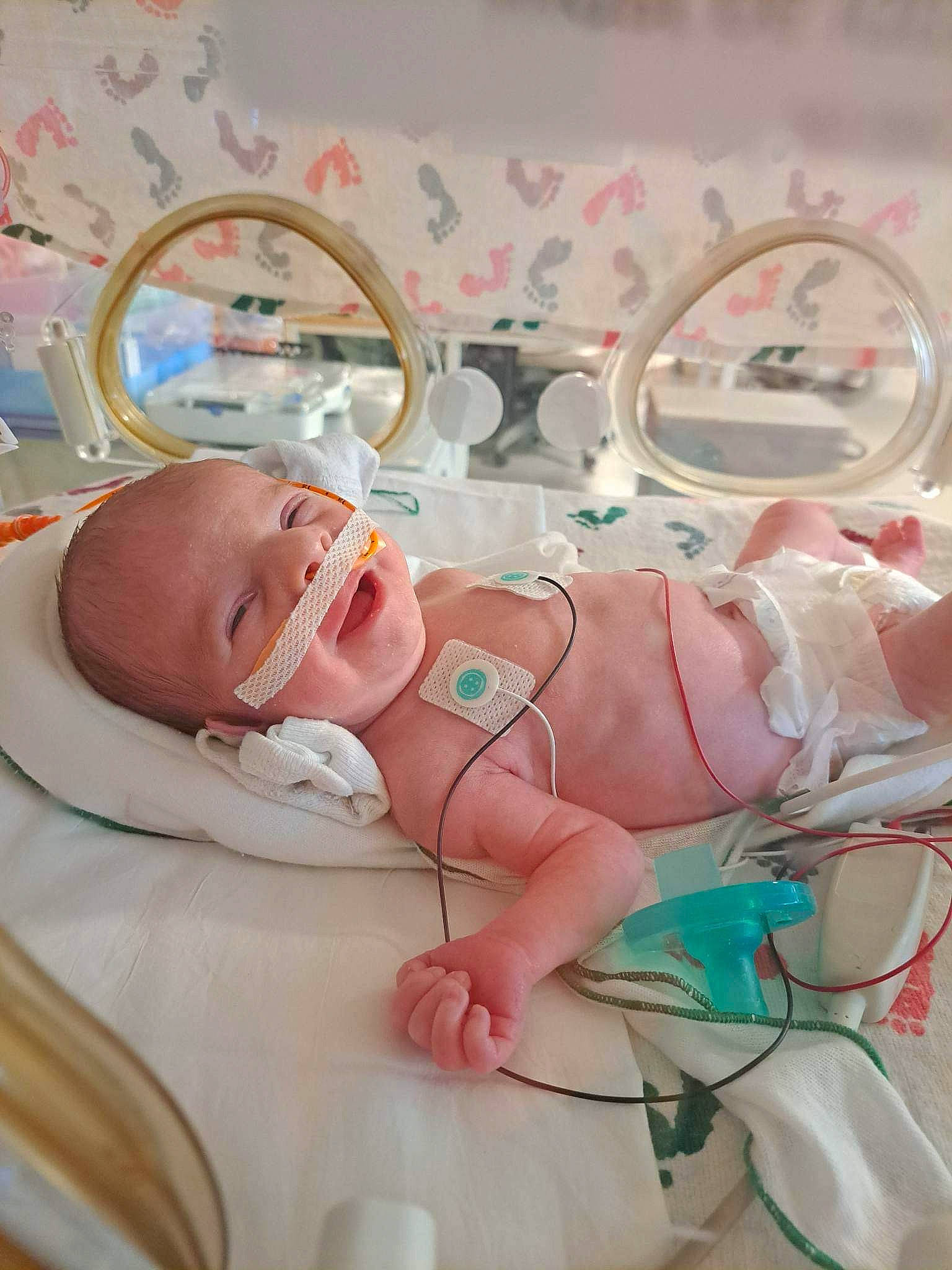 Ryker joined the competition — help win amazing prizes! baby, baby_products, baby_safety, baby_toddler_clothing, bed, child, comfort, event, health_care, hospital, linens, medical, medical_equipment, pediatrics, person, product, room, service, skin, smile