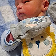 Jw joined the competition — help win amazing prizes! newborn, baby, infant, mitten, lion_bib, blanket, onesie, face, head, sleepwear, cute, soft, lying_down, blue, white, star_pattern, pacifier, cartoon, child, portrait