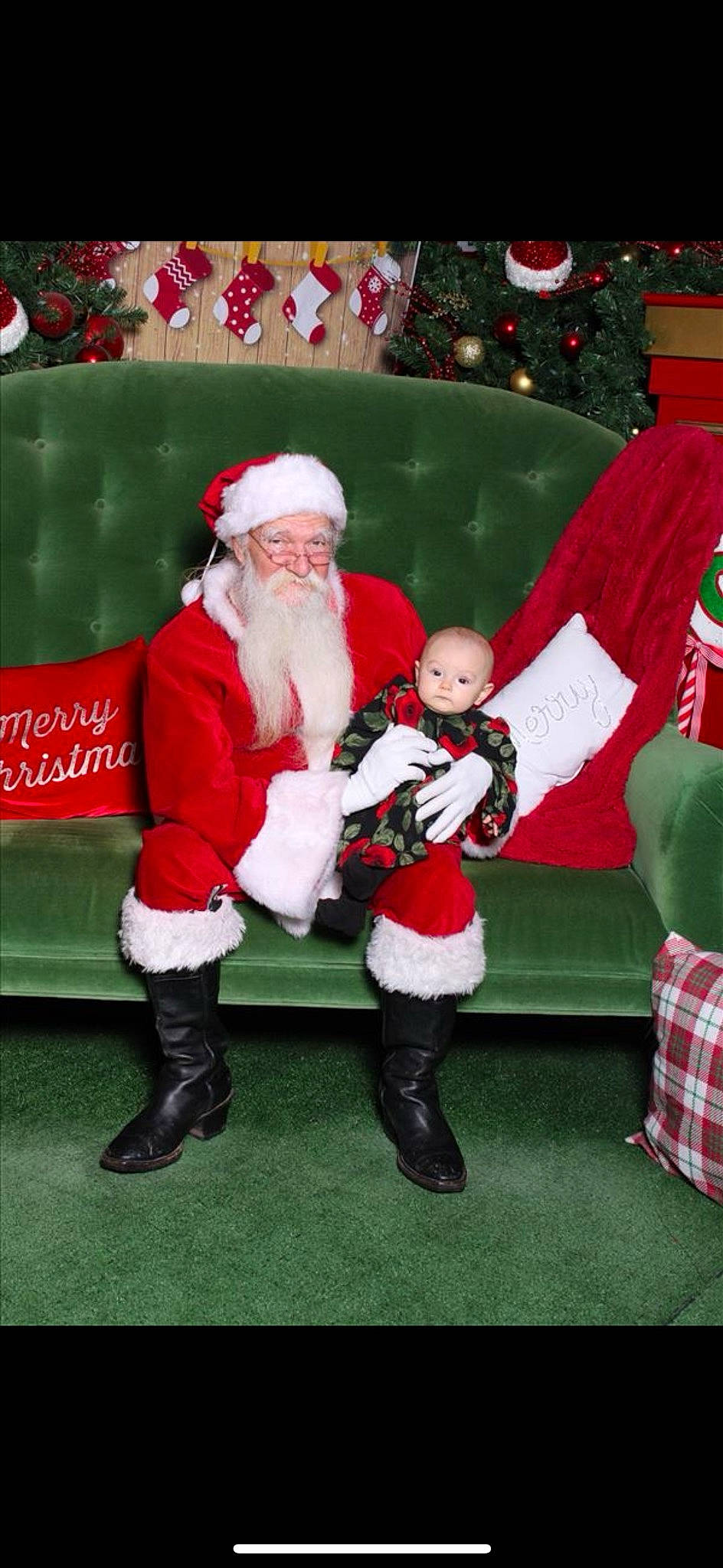 Phoenix joined the competition — help win amazing prizes! baby, beard, boot, child, christmas, christmas_eve, costume_hat, event, fictional_character, fun, green, happy, hat, holiday, lap, person, plant, red, santa_claus, toddler