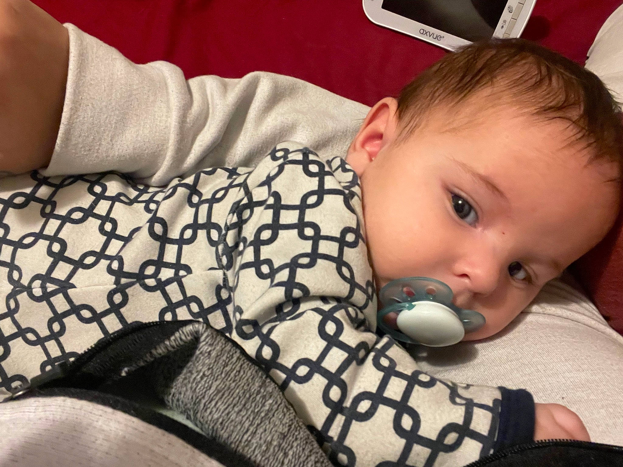 Jerremiah is registered to the contest to win money with this photo: baby, baby_products, baby_toddler_clothing, black, cheek, child, comfort, eyebrow, eyelash, iris, lip, mammal, mouth, nose, pattern, person, sitting, skin, sleeve, toddler