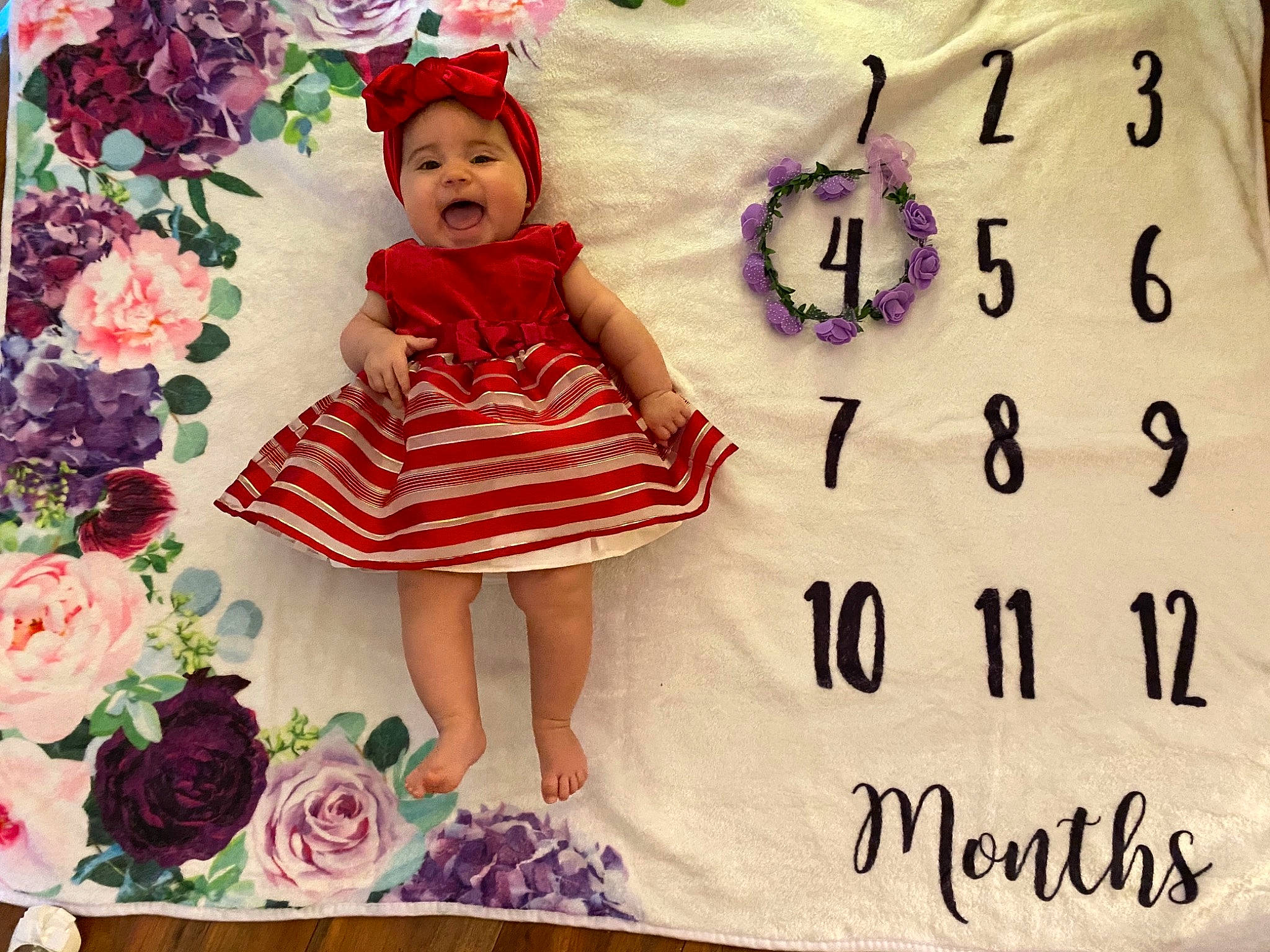 Jazlynn joined the competition — help win amazing prizes! baby_toddler_clothing, child, day_dress, dress, flowering_plant, garden_roses, happy, headwear, human, lavender, magenta, one_piece_garment, pattern, person, petal, pink, purple, rose, rose_family, rose_order