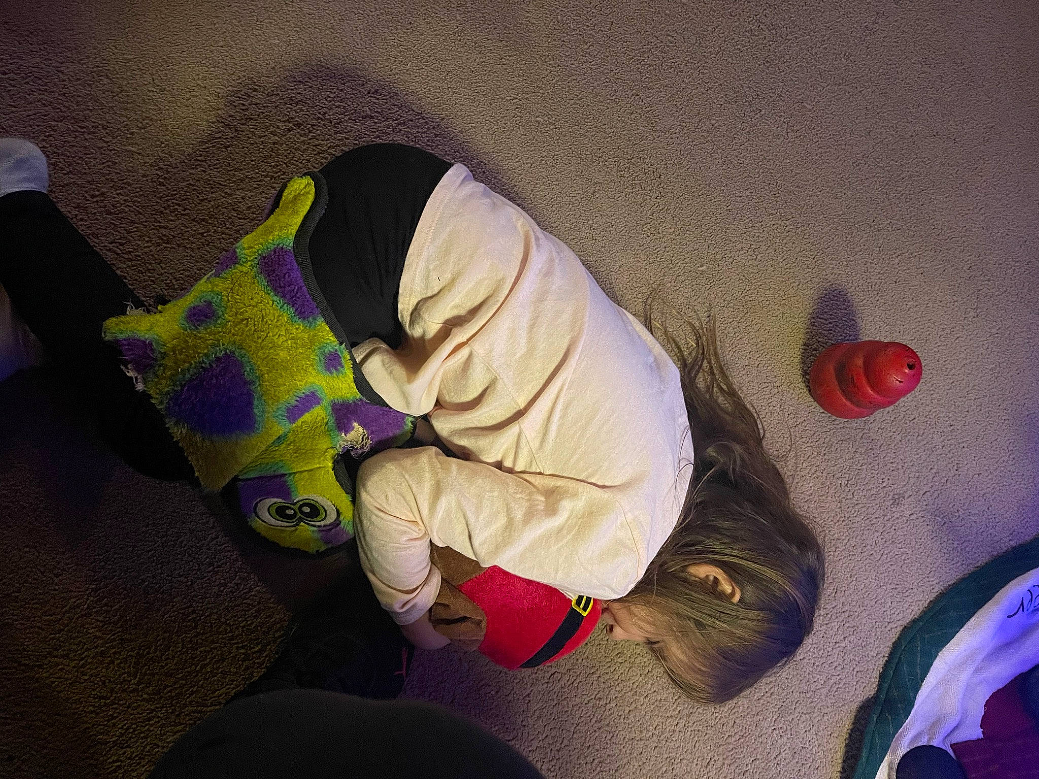 Raelynn is registered to the contest to win money with this photo: baby, baby_toddler_clothing, carmine, child, comfort, design, electric_blue, floor, flooring, human_leg, magenta, pattern, person, personal_protective_equipment, purple, room, sitting, space, textile, tints_and_shades