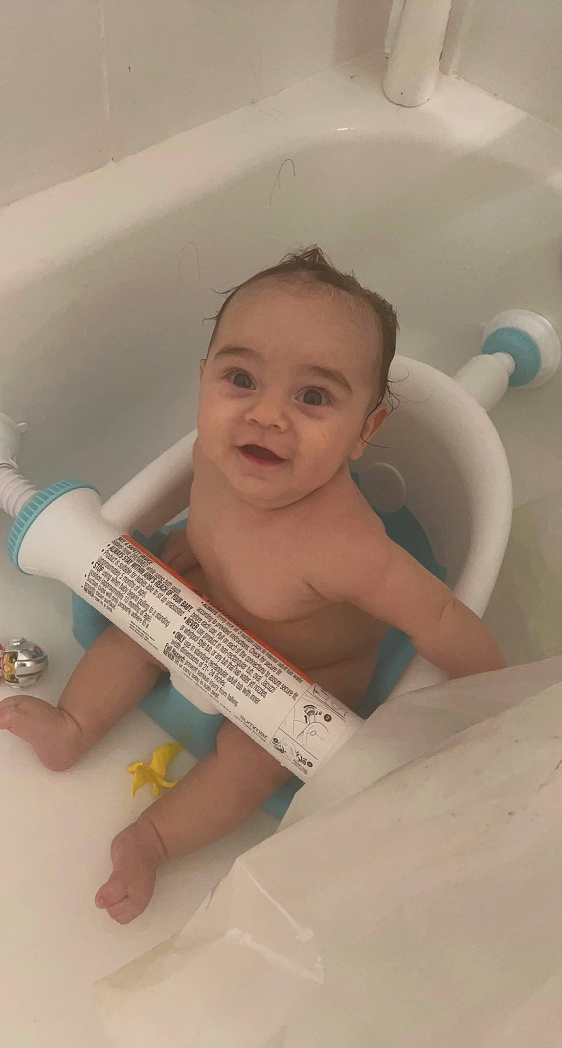 Azriel is registered to the contest to win money with this photo: abdomen, baby, barechested, bathing, chest, comfort, eyebrow, eyelash, finger, fun, hand, happy, person, plumbing_fixture, shoulder, skin, smile, thigh, thumb, toddler