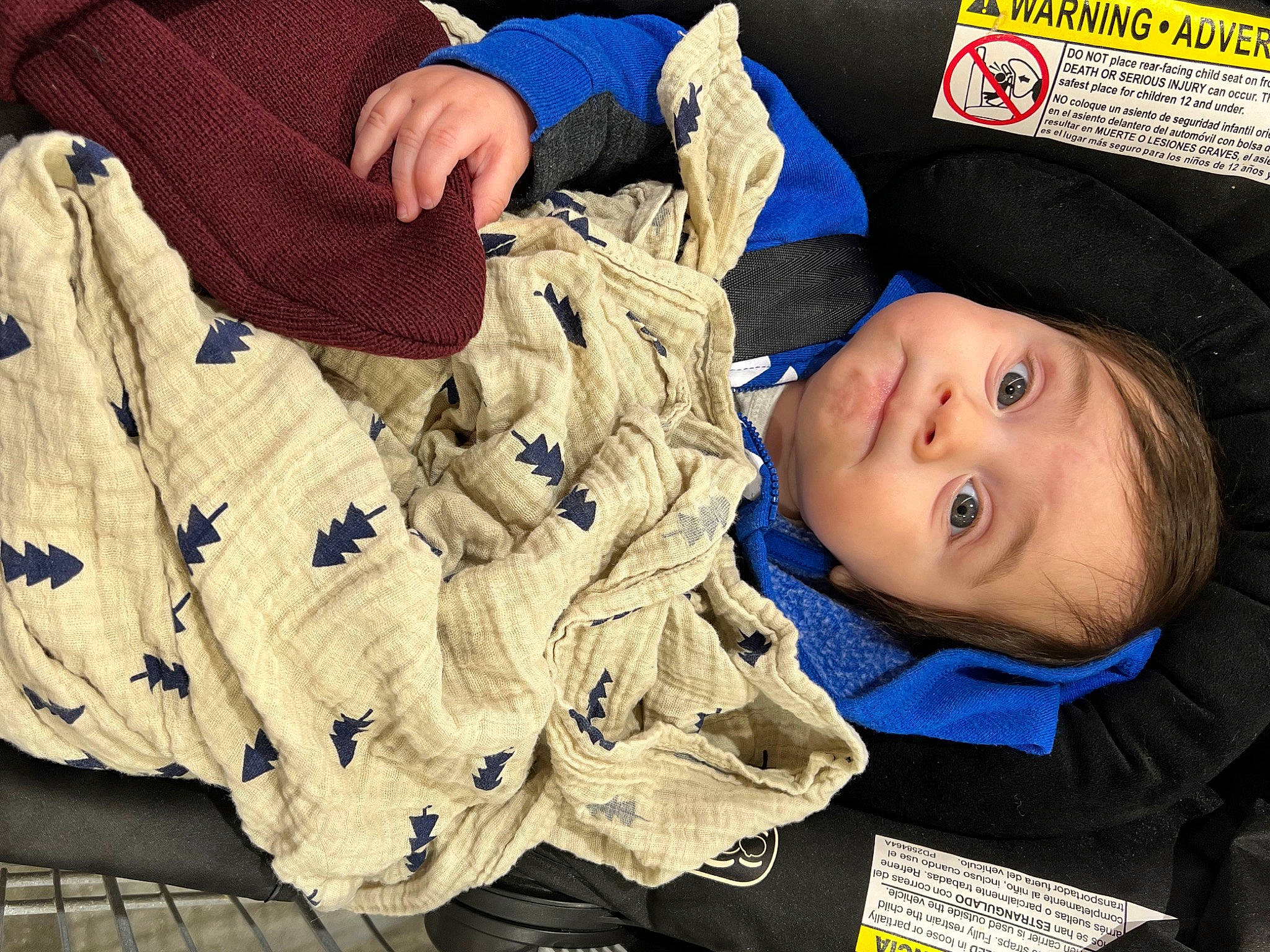 Azriel is registered to the contest to win money with this photo: baby, baby_products, baby_toddler_clothing, cheek, child, comfort, electric_blue, event, human, outerwear, pattern, people, person, product, sitting, sleeve, toddler