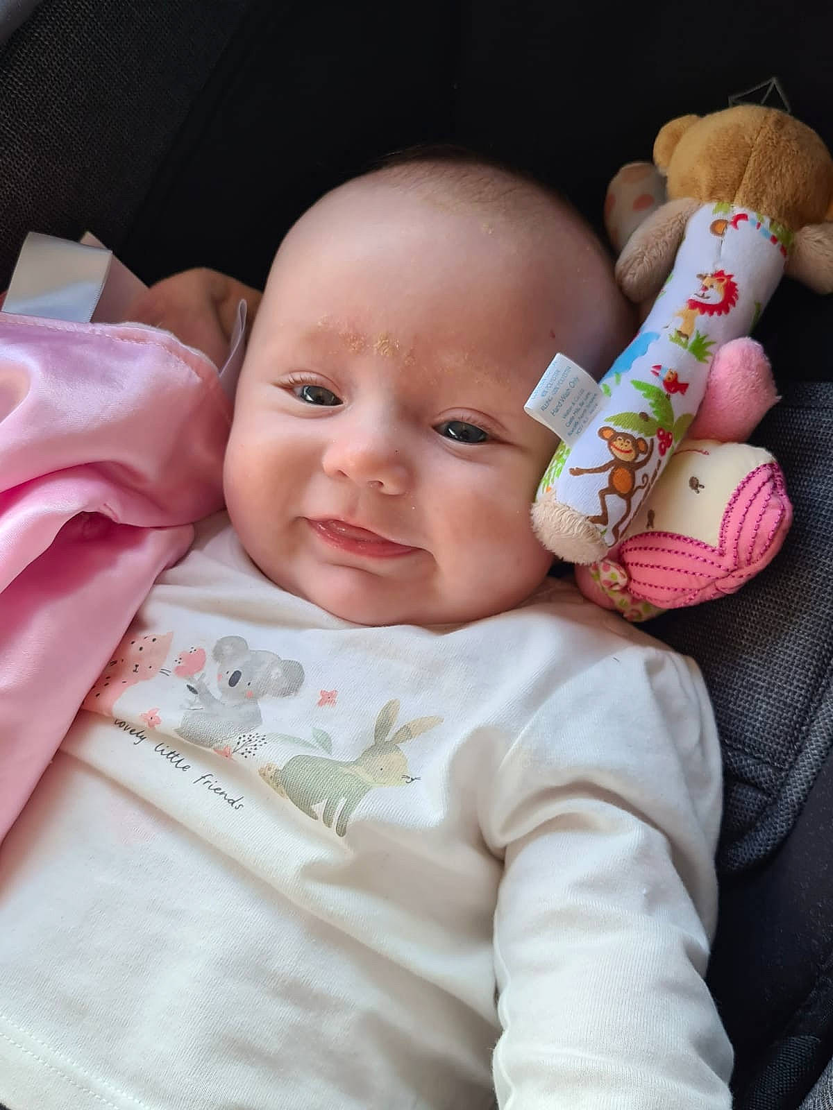 Harleigh is registered to the contest to win money with this photo: baby, baby_toddler_clothing, cheek, child, chin, collar, comfort, eye, finger, gesture, happy, iris, lip, nose, person, pink, product, skin, sleeve, textile