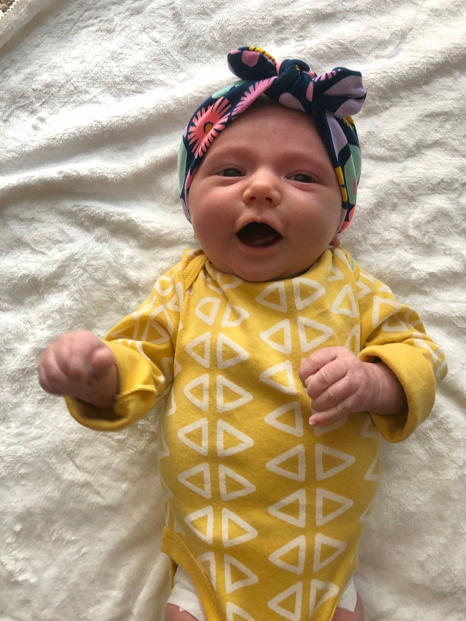 Emery Grace is registered to the contest to win money with this photo: baby, child, head, headwear, person, smile, toddler, yellow