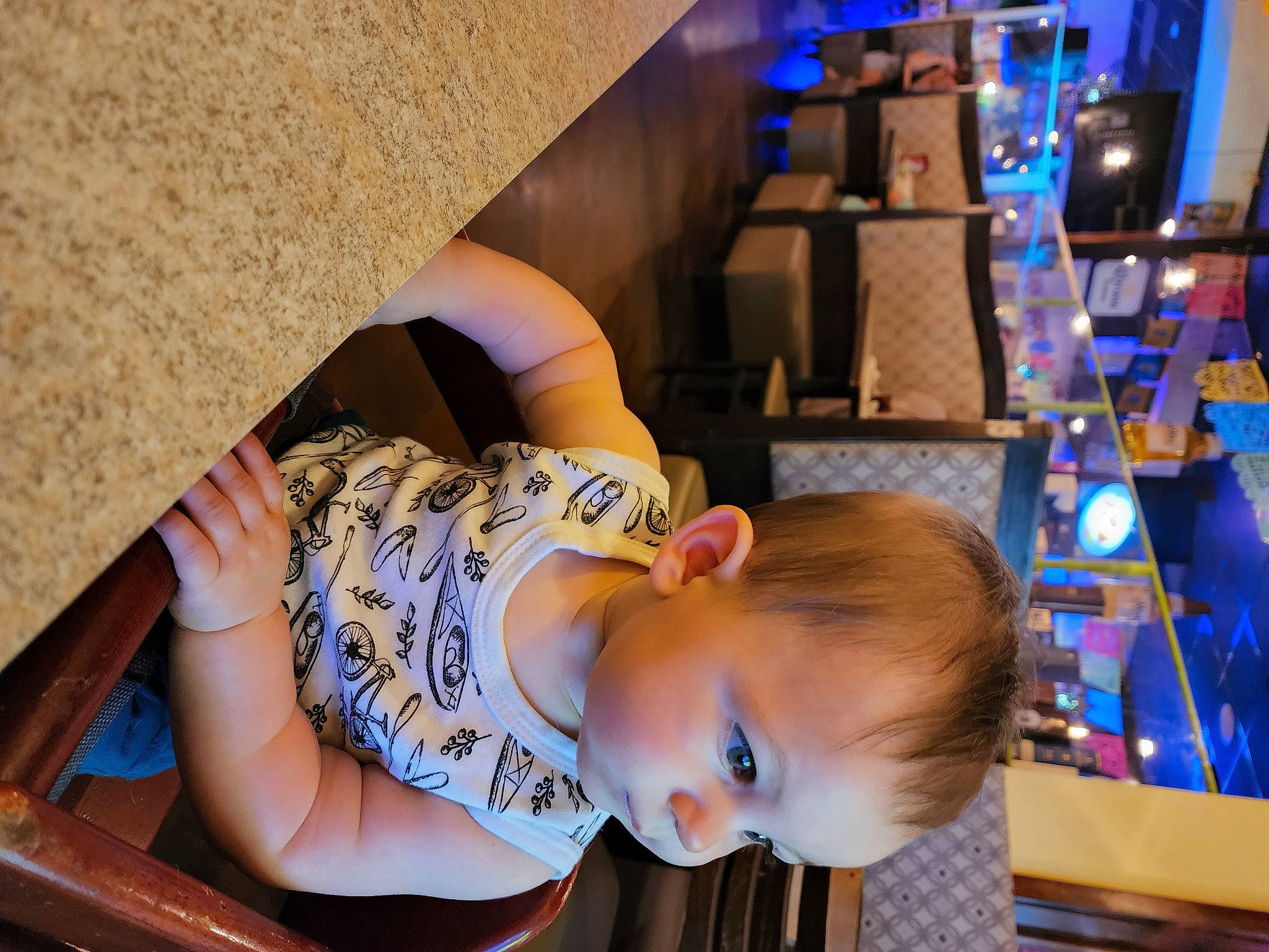 Jackson is registered to the contest to win money with this photo: audio_equipment, blue, child, electric_blue, eyewear, fun, happy, human_leg, leisure, machine, person, room, shorts, sitting, t_shirt, thigh, toddler, tree, vacation, wood