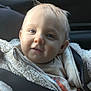 baby, backseat, car_interior, cheeks, child, closeup, cozy, eyes, fleece_jacket, hair, happy, hood, infant, light, portrait, seat, seatbelt, smile, soft_texture, window