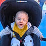 Léandro participe au concours pour gagner de l'argent avec cette photo : amusement_park, baby, bib, blue_floor, canopy, child, crowd, face, hands, happy, infant, outdoor, pants, portrait, seat_harness, smile, socks, stroller, sweater, toy_stall