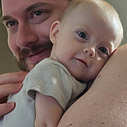 Aurora joined the competition — help win amazing prizes! baby, adult, face, shoulder, skin, smile, close_up, portrait, cuddling, love, affection, person, human, head, eyes, hair, indoors, expression, warmth, bond
