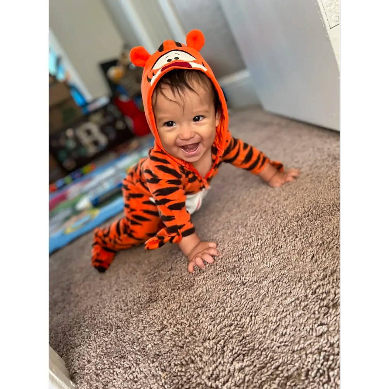 Israel joined the competition — help win amazing prizes! asphalt, baby, baby_toddler_clothing, bicycle_helmet, cap, child, crawling, electronic_device, face, flooring, font, gadget, happy, joy, orange, pattern, person, product, sleeve, smile