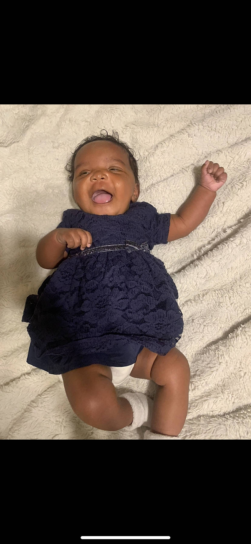 Novah is registered to the contest to win money with this photo: baby, baby_toddler_clothing, cheek, child, facial_expression, finger, flash_photography, fun, gesture, happy, human_leg, iris, person, pink, skin, sleeve, smile, standing, textile, thigh