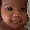 Talayah joined the competition — help win amazing prizes! baby, blanket, child, chubby_cheeks, close_up, comfort, curious_eyes, cute, face, head, indoors, infant, person, portrait, skin, sleepy, smile, soft, warm, young