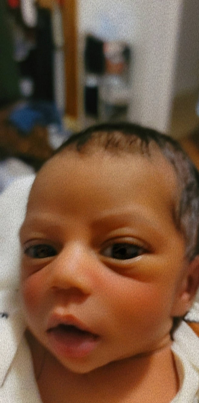 Hendrix joined the competition — help win amazing prizes! baby, black_hair, cheek, child, close_up, ear, eyebrow, eyelash, forehead, fun, happy, iris, lip, nose, person, skin, smile, thumb, toddler, wrinkle