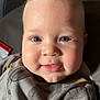 Kohen joined the competition — help win amazing prizes! baby, child, face, blue_eyes, smile, mohawk, onesie, clothing, infant, cute, portrait, closeup, happy, skin, head, person, young, expression, indoors, soft_light