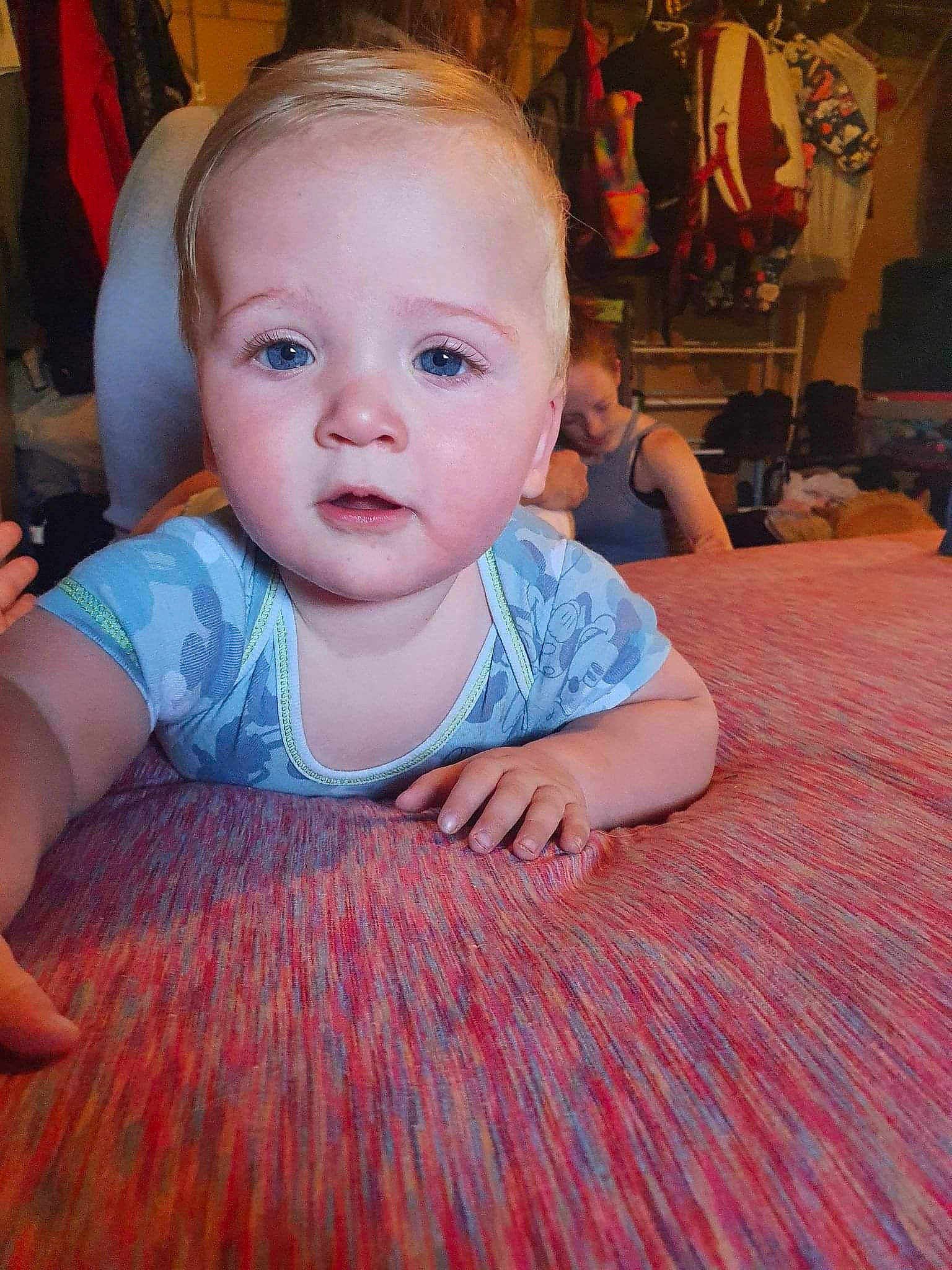 Wyatt joined the competition — help win amazing prizes! baby, baby_toddler_clothing, cheek, child, flash_photography, floor, flooring, fun, hairstyle, happy, hardwood, head, iris, nose, person, pink, sitting, skin, smile, toddler