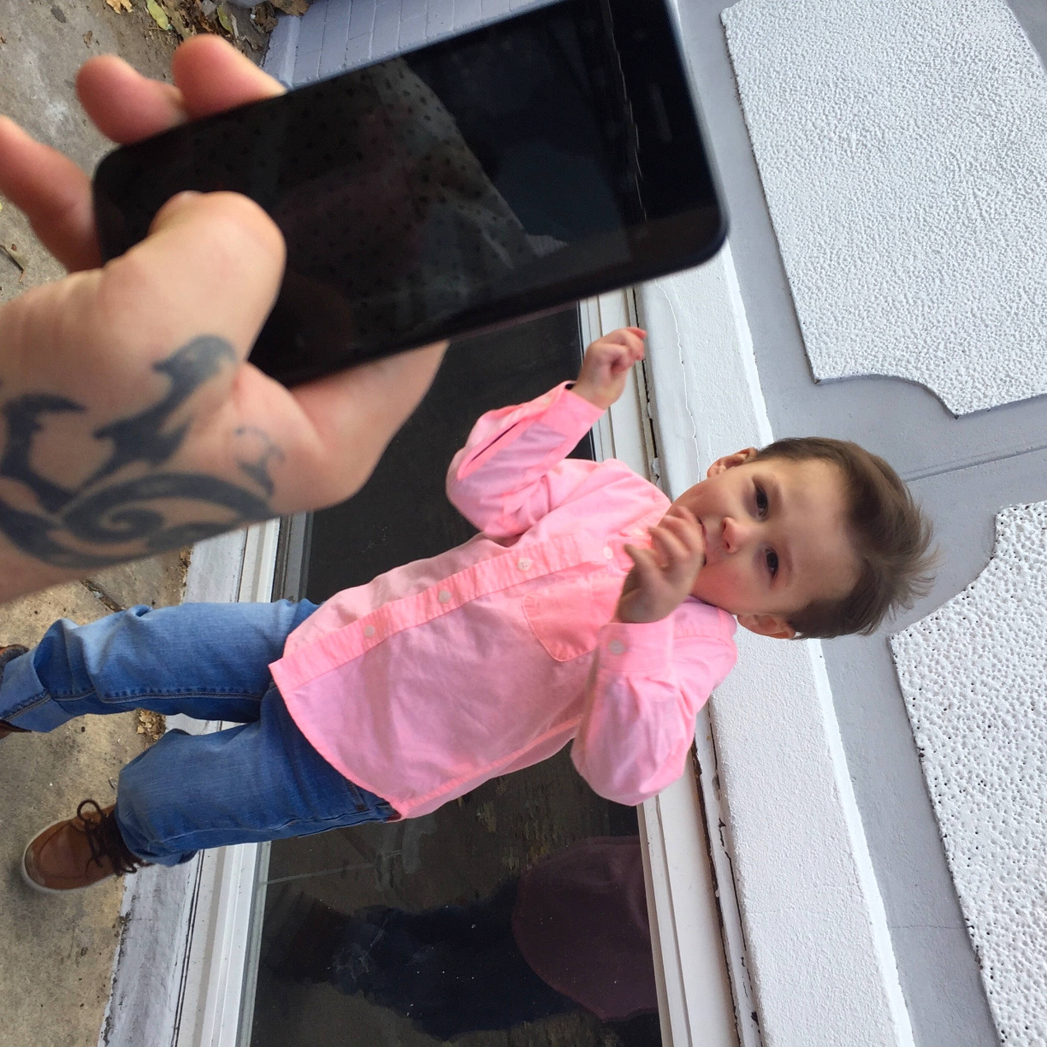 Rocky is registered to the contest to win money with this photo: automotive_exterior, bumper, child, elbow, finger, foot, fun, gesture, human, human_leg, knee, leisure, mouth, person, product, temporary_tattoo, thigh, thumb, toddler, vehicle_door