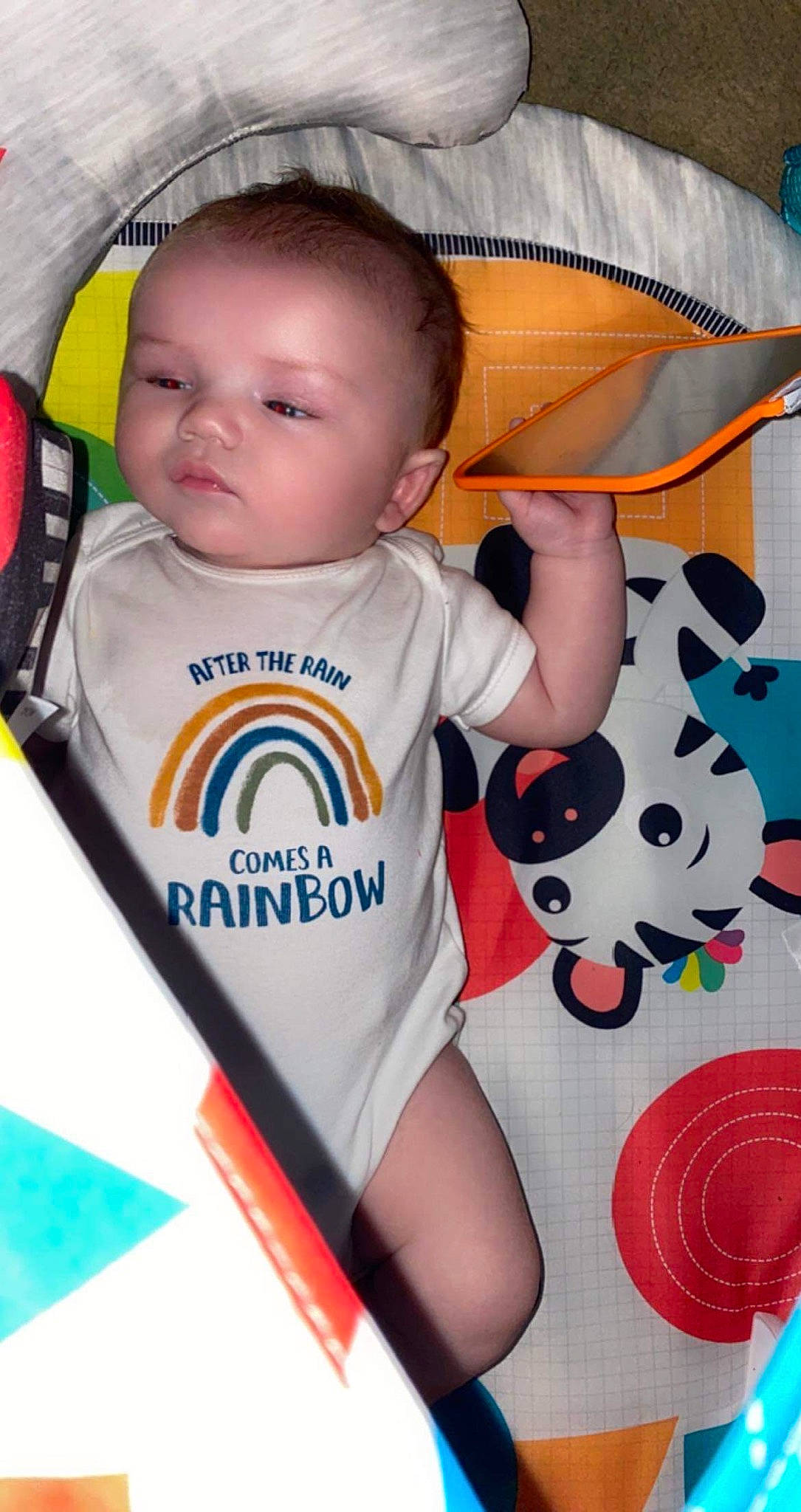 Caspian is registered to the contest to win money with this photo: baby, baby_products, baby_safety, baby_toddler_clothing, bib, carmine, cheek, child, comfort, design, fun, happy, pattern, person, personal_protective_equipment, play, sitting, sleeve, t_shirt, thigh