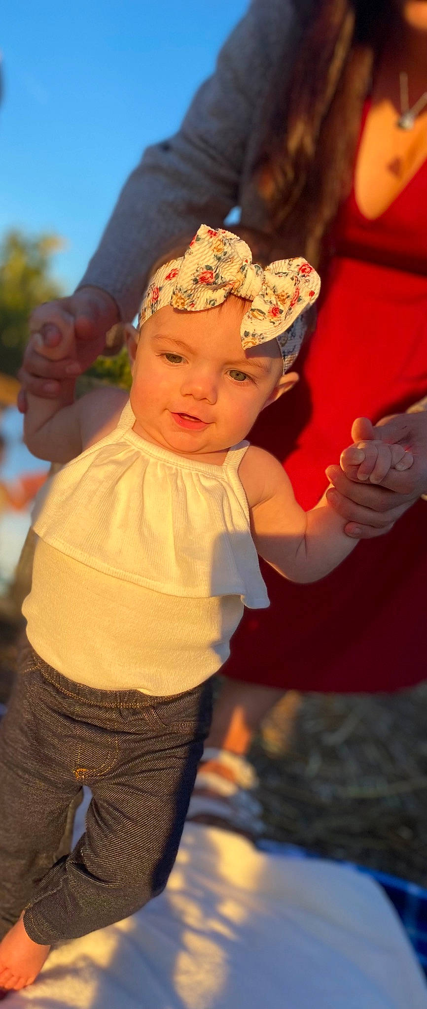 Haven is registered to the contest to win money with this photo: baby, baby_toddler_clothing, cap, child, event, fashion_accessory, finger, fun, gesture, grass, happy, headgear, headpiece, headwear, leisure, magenta, person, pink, play, recreation