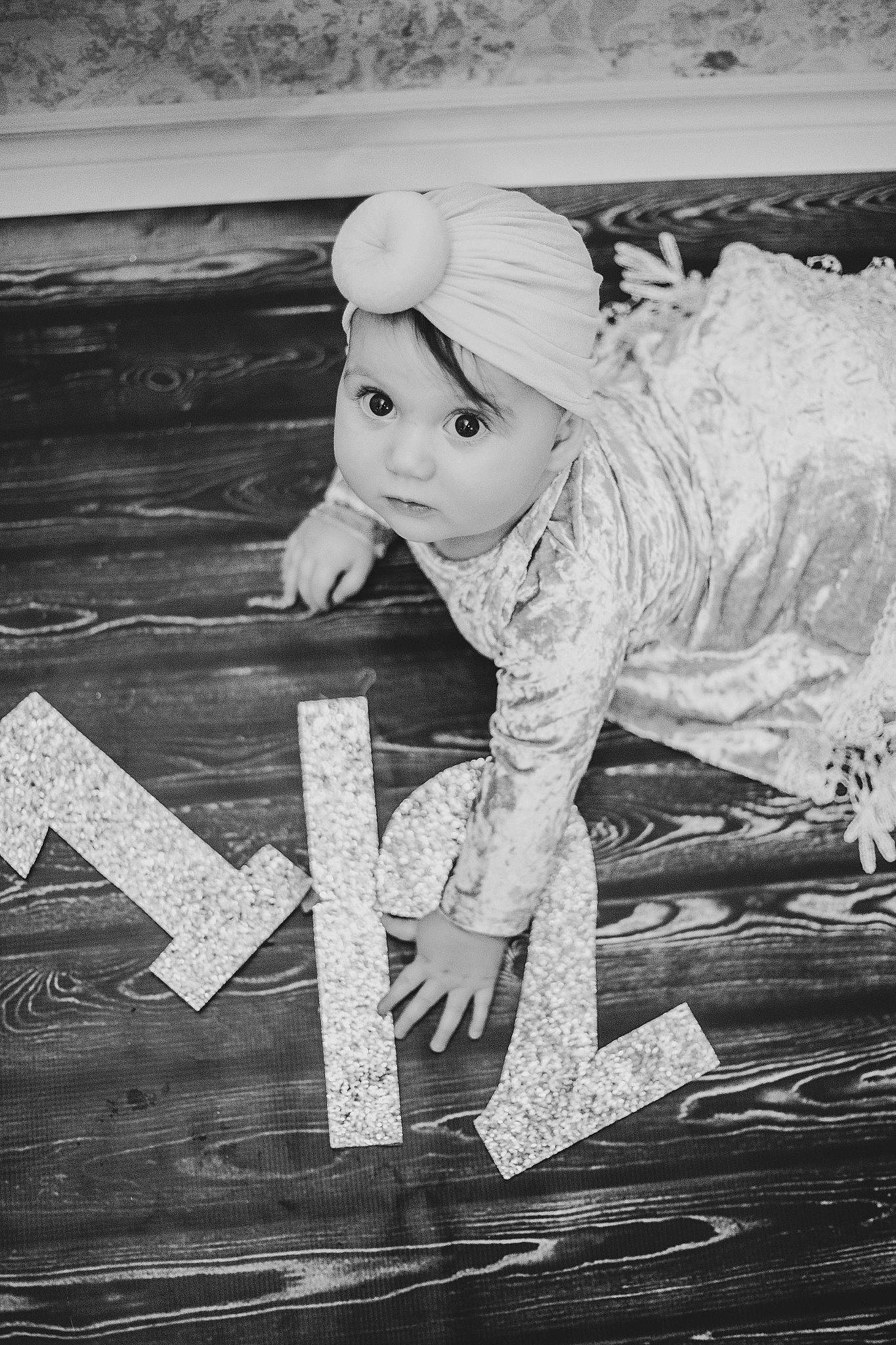 Viviana joined the competition — help win amazing prizes! baby, black_and_white, child, flash_photography, flooring, happy, headwear, monochrome, monochrome_photography, person, portrait_photography, sitting, stock_photography, style, toddler, vintage_clothing, wood