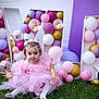 Ayla Medeea participe au concours pour gagner de l'argent avec cette photo : toddler, child, pink_dress, balloons, grass, butterfly, headpiece, celebration, party, colorful, pastel_colors, outdoor, smiling, cute, festive, birthday, decorations, sitting, happy, person