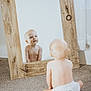 Ryatt joined the competition — help win amazing prizes! baby, child, mirror, reflection, diaper, carpet, wooden_frame, indoor, curious, sitting, blond_hair, skin, person, floor, home, cute, looking, infant, young_child, self_reflection