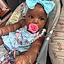 Kylani joined the competition — help win amazing prizes! baby, infant, pacifier, headband, blue_bow, bracelet, baby_chair, floral_pattern, pink, blue, clothing, cute, child, indoors, person, portrait, baby_accessories, skin, hand, curious