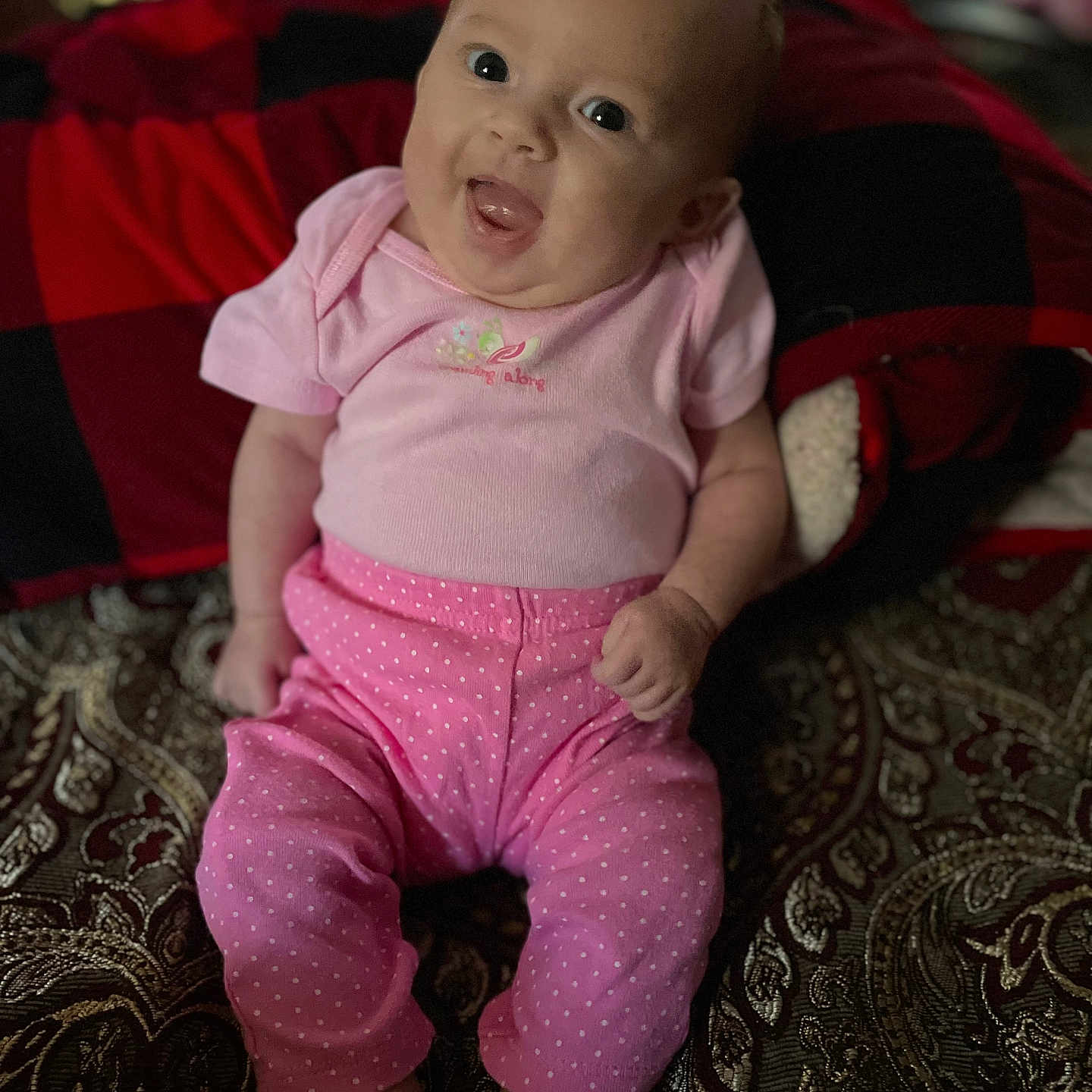 Kaylee is registered to the contest to win money with this photo: applique, architecture, baby, babylaughing, bed, bedroom, blanket, bodypart, building, clothing, couch, crawling, cushion, dress, face, finger, footwear, furniture, hand, happy