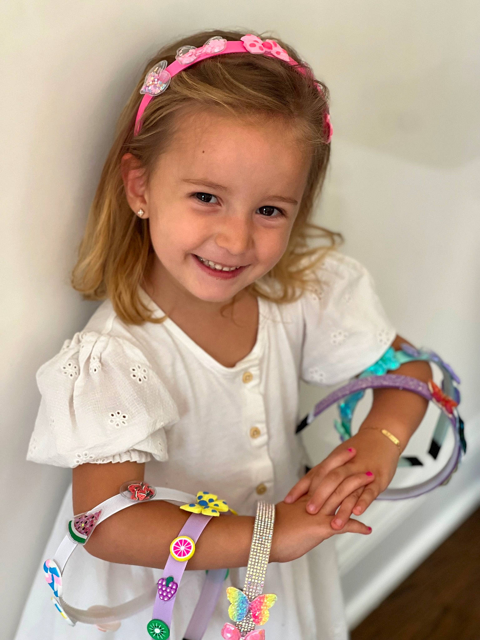Adora joined the competition — help win amazing prizes! baby, baby_toddler_clothing, bracelet, child, dress, event, fashion_accessory, fun, happy, headband, headpiece, jewellery, joy, pattern, person, pink, sitting, skin, sleeve, smile