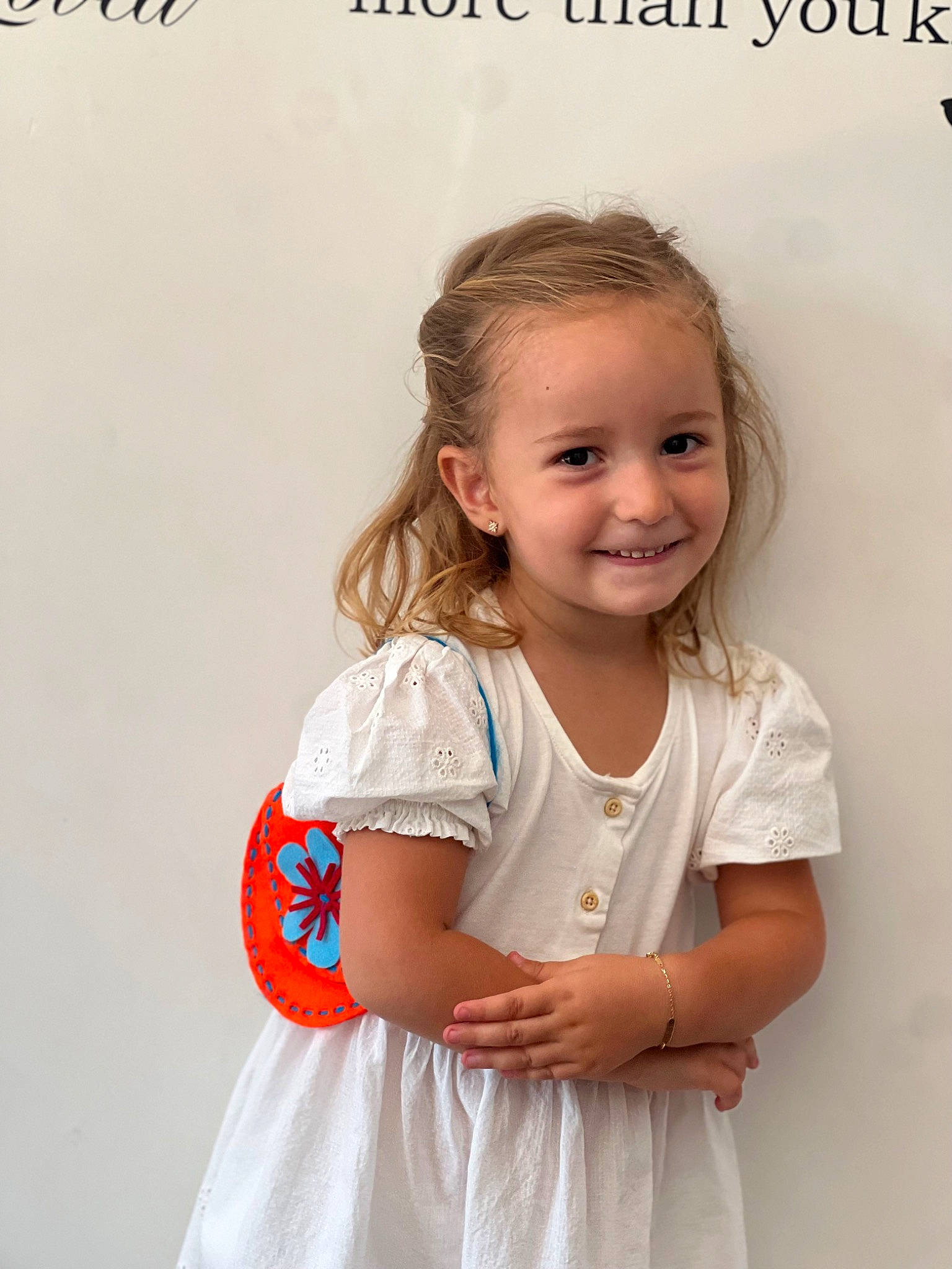 Adora is registered to the contest to win money with this photo: arm, baby_toddler_clothing, child, chin, clothing, day_dress, dress, eye, fashion_design, flash_photography, gesture, hair, happy, joy, neck, one_piece_garment, person, skin, sleeve, smile