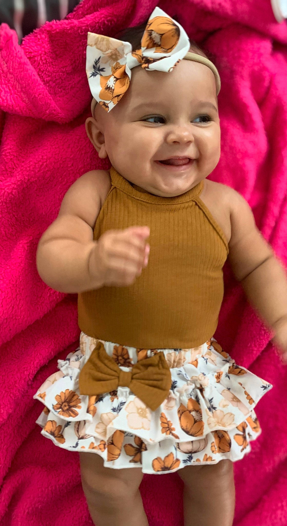 Aisa is registered to the contest to win money with this photo: arm, baby, baby_toddler_clothing, cheek, child, dress, face, finger, fun, green, hand, happy, head, headwear, joy, person, pink, skin, sleeve, smile