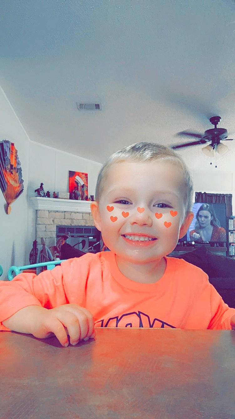 Logan is registered to the contest to win money with this photo: baby, cheek, child, cool, ear, eye, face, finger, forehead, head, joy, lip, nose, person, photography, room, skin, toddler, vacation