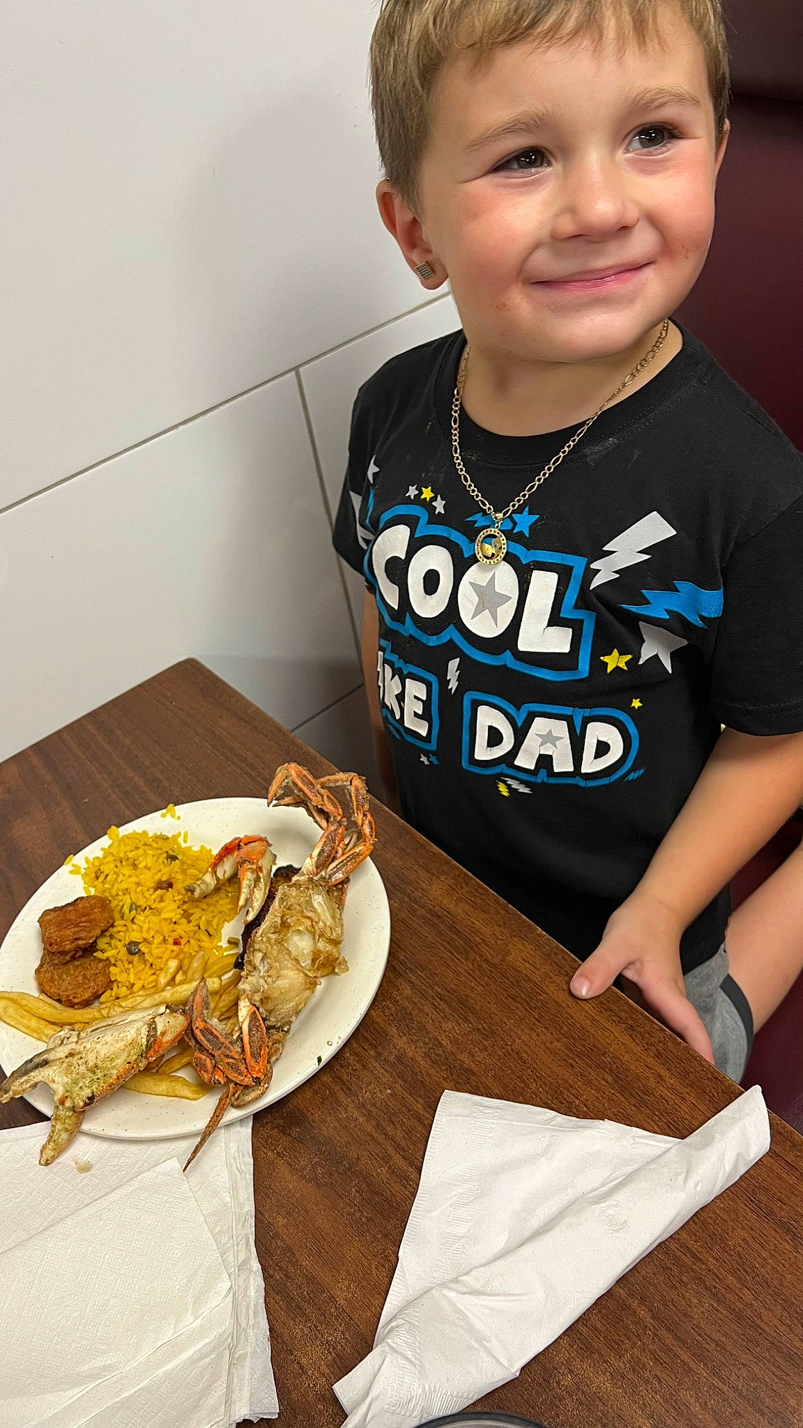 Dawson joined the competition — help win amazing prizes! baby_toddler_clothing, chair, cuisine, dish, eye, fast_food, food, food_craving, fork, happy, ingredient, joy, person, plate, recipe, sleeve, smile, staple_food, t_shirt, table