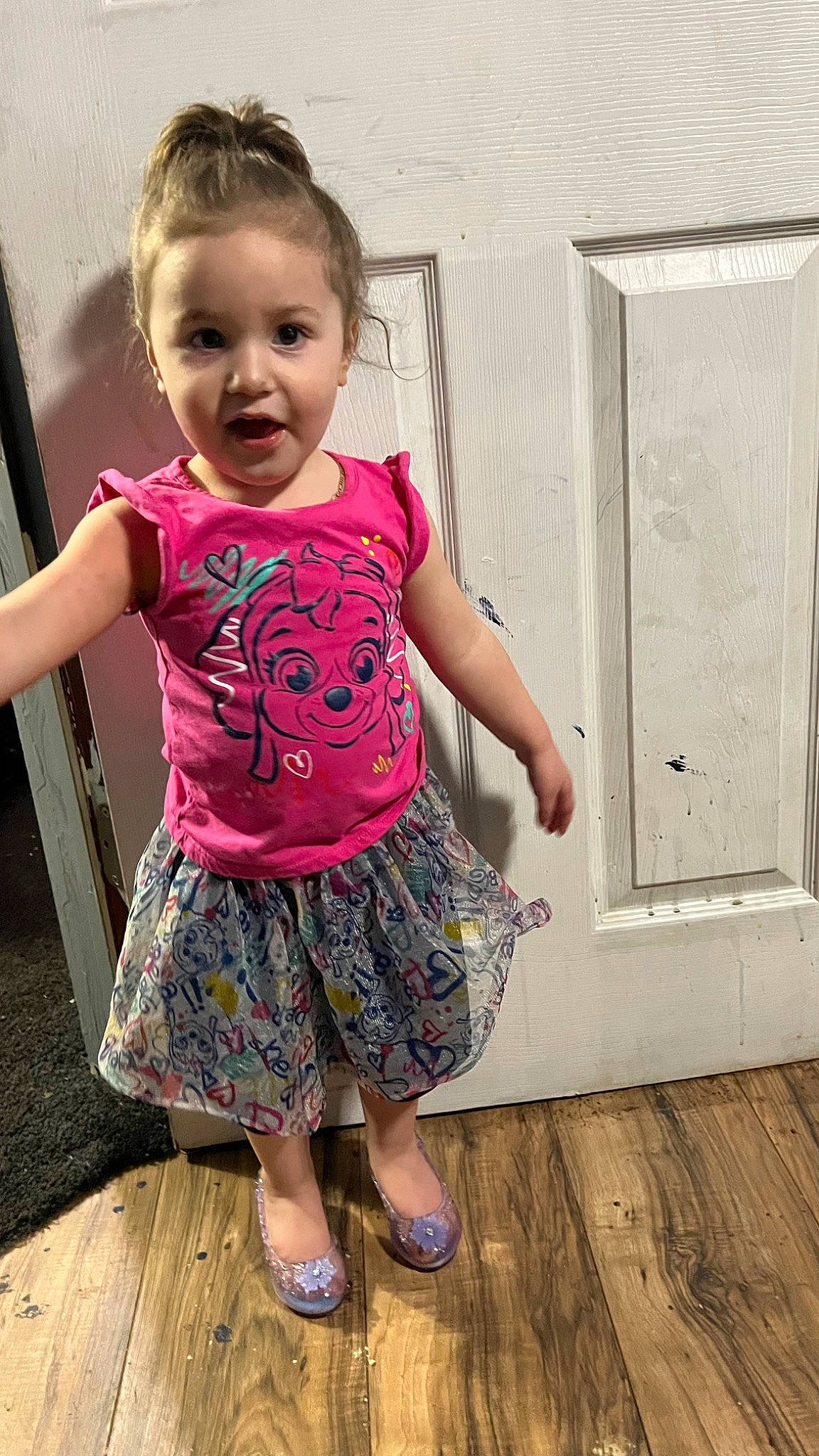 Avery Grace is registered to the contest to win money with this photo: baby_toddler_clothing, blond, child, day_dress, face, fun, happy, hardwood, human_leg, leg, magenta, pattern, person, pink, shoulder, sleeve, smile, toddler, trunk, waist