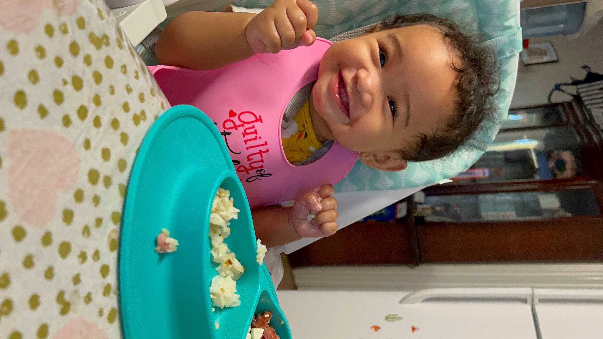 Elise is registered to the contest to win money with this photo: baby, baby_laughing, baby_playing_with_toys, baby_toddler_clothing, child, face, fun, happy, icing, joy, laugh, leisure, person, plate, play, recreation, room, smile, t_shirt, toddler