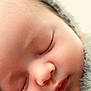 Raphaël participe au concours pour gagner de l'argent avec cette photo : baby, newborn, sleeping, close_up, face, infant, cheeks, eyelashes, nose, lips, soft_texture, fuzzy_hat, blanket, cozy, peaceful, portrait, skin, macro, newborn_photography, resting
