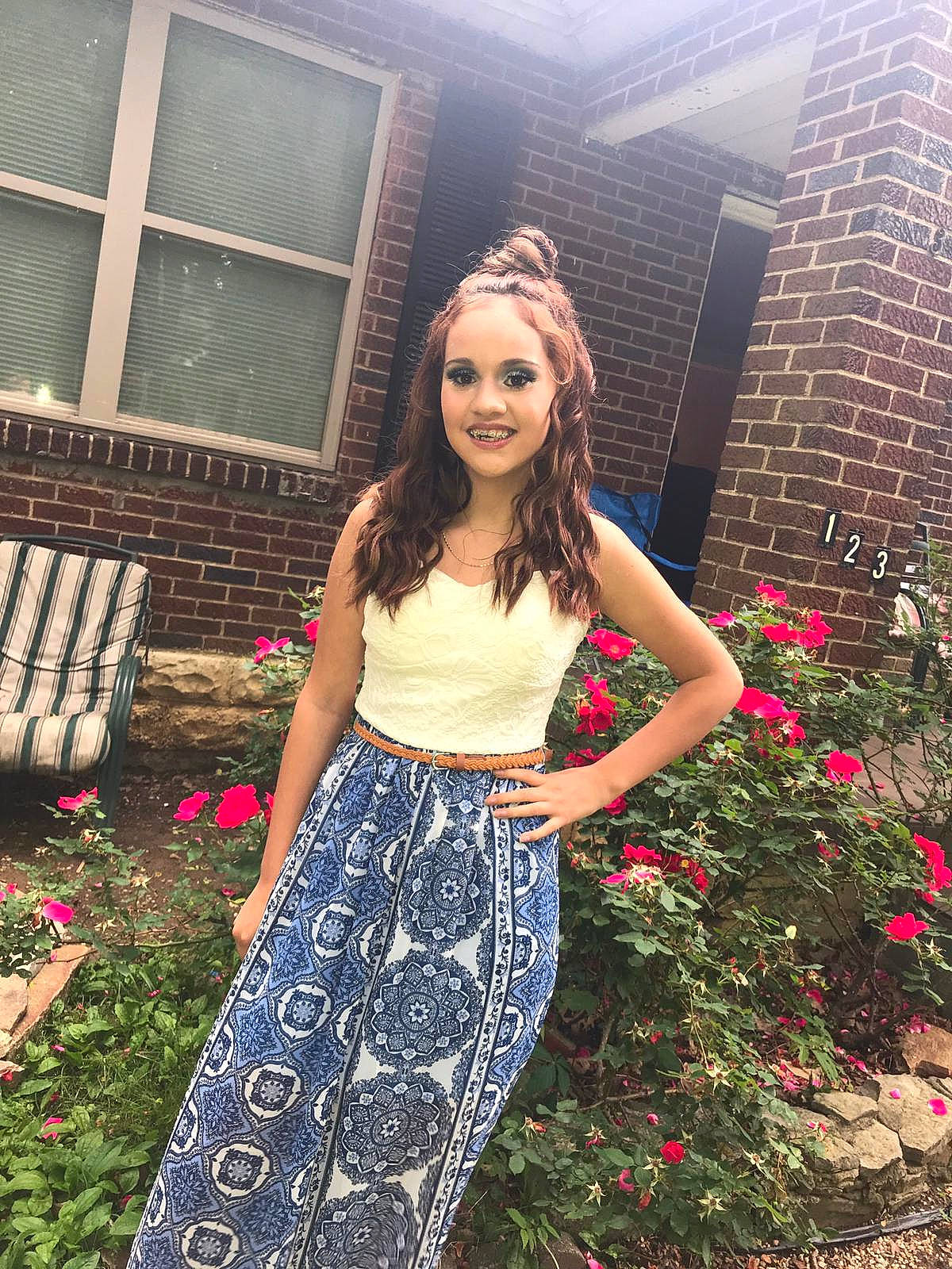 Alejandra is registered to the contest to win money with this photo: beauty, blond, brown_hair, clothing, crop_top, dress, fashion, flower, garden, joy, lady, lip, long_hair, pattern, person, photo_shoot, photography, pink, plant, spring