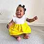 Aléa a rejoint le concours — aidez-le/la à gagner de superbes lots ! baby, babylaughing, bodypart, clothing, dress, face, finger, hand, happy, head, pants, person, photography, portrait, shorts, sitting, skirt, sleeve, smile, standing